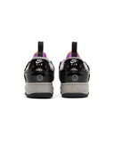 Black Nike Air sneakers with purple accents on a white background